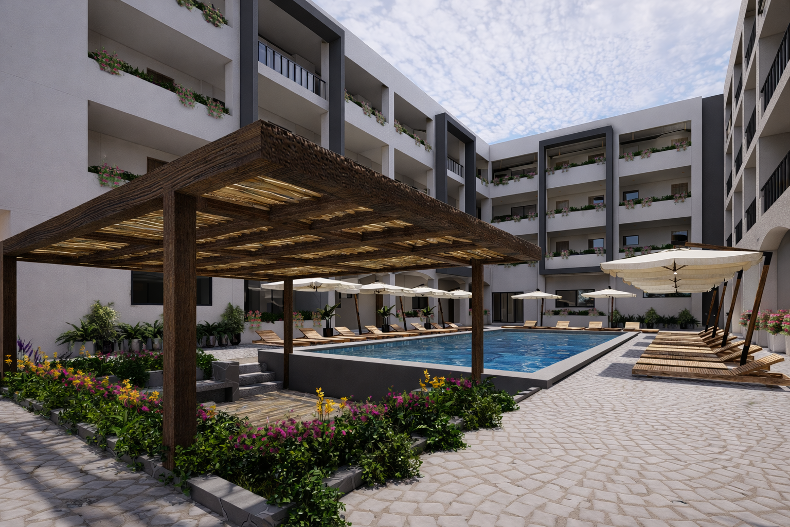 Zona social con pérgola al atardecer en Sundara Condos & Plaza, Huatulco